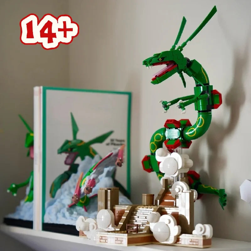 Rayquaza de bloques junto a un libro